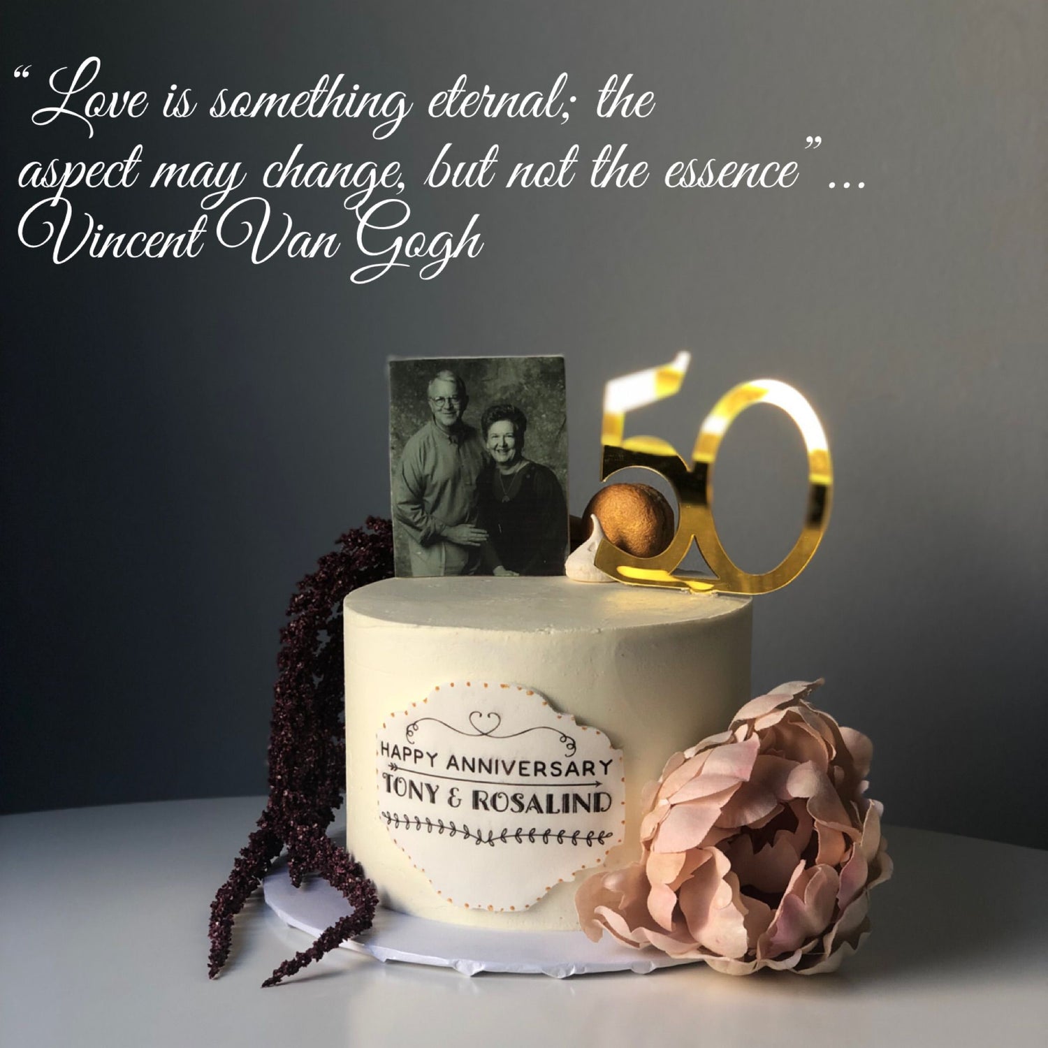 Custom Anniversary cake with number 50 topper, edible photo of couple.